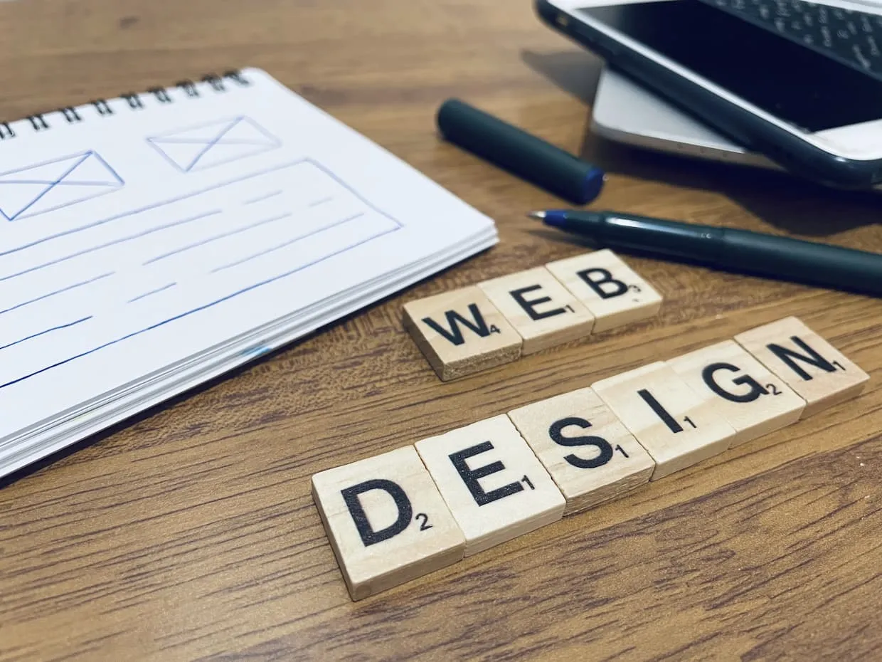 Scrabble letters forming the words "Web Design".